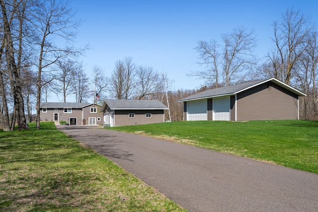 695 Pine Lake Ln, Bone Lake Twp, WI 54837 - ranch-style home with a front lawn and a garage