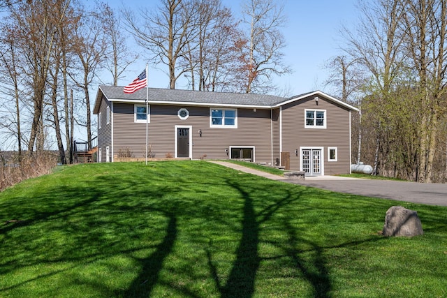 695 Pine Lake Ln, Bone Lake Twp, WI 54837 - view of front of property with a front lawn and french doors