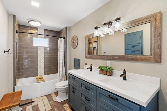 695 Pine Lake Ln, Bone Lake Twp, WI 54837 - full bath featuring a sink, shower / bath combo, toilet, and wood finished floors