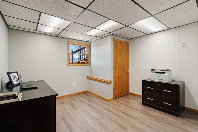 695 Pine Lake Ln, Bone Lake Twp, WI 54837 - unfurnished office with light wood finished floors, a drop ceiling, and baseboards