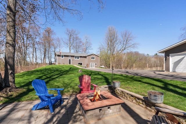 695 Pine Lake Ln, Bone Lake Twp, WI 54837 - view of patio with an outdoor fire pit