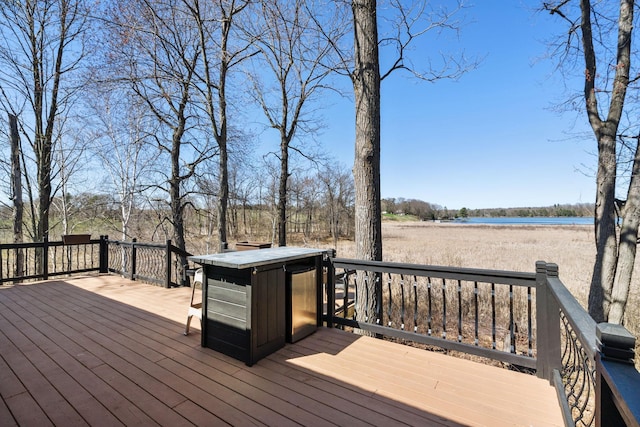 695 Pine Lake Ln, Bone Lake Twp, WI 54837 - wooden terrace with a water view
