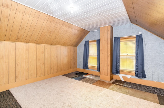 316 Main St, Belle Plaine, MN 56011 - additional living space featuring lofted ceiling, carpet flooring, wood walls, and wood ceiling