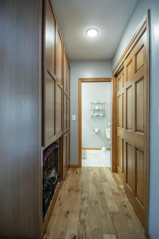 interior space with light wood-style flooring and a fireplace