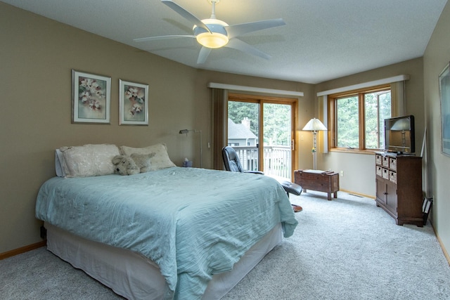 35533 Sand Pointe Dr Unit 6, Crosslake, MN 56442 - bedroom featuring baseboards, access to outside, a ceiling fan, and carpet flooring