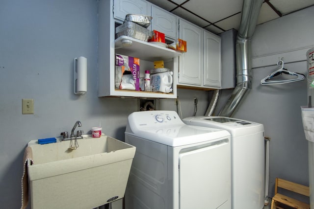 35533 Sand Pointe Dr Unit 6, Crosslake, MN 56442 - washroom with a sink, cabinet space, and washer and clothes dryer