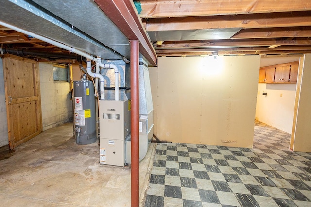 unfinished below grade area with heating unit and gas water heater