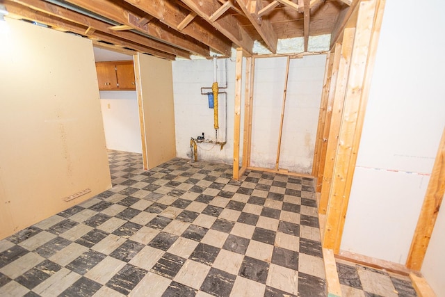 unfinished below grade area featuring tile patterned floors
