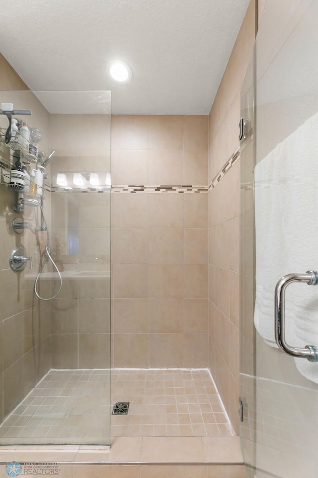 bathroom with a stall shower