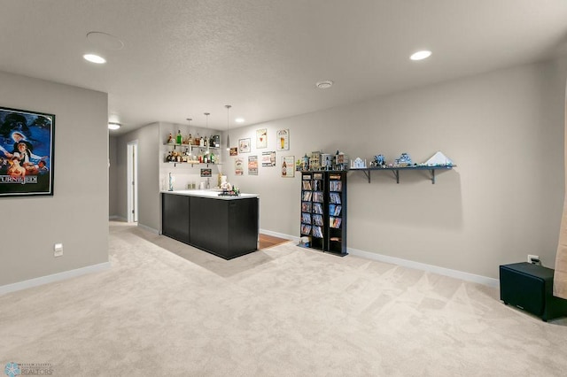 bar featuring light colored carpet, baseboards, and recessed lighting