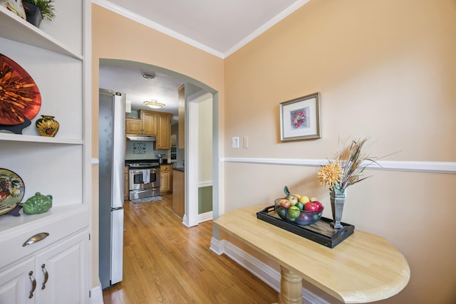 4904 11th Ave S, Minneapolis, MN 55417 - hall with arched walkways, ornamental molding, and light wood-style flooring