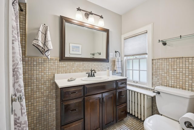 4904 11th Ave S, Minneapolis, MN 55417 - full bath featuring tile walls, vanity, tile patterned flooring, wainscoting, and a shower with curtain