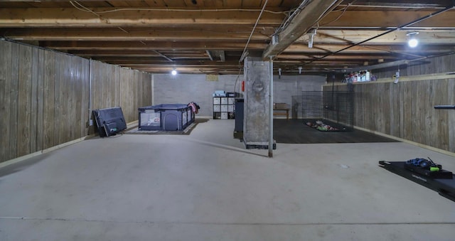 unfinished basement with wooden walls