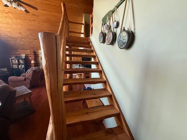 stairs with a ceiling fan