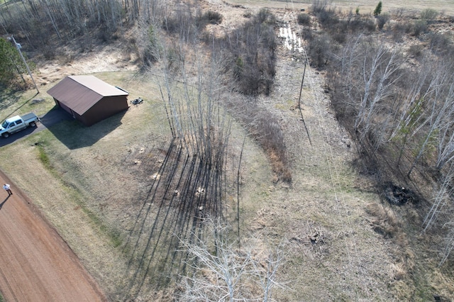 birds eye view of property featuring a rural view