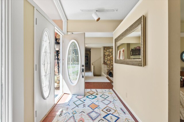 1206 Pinecrest Ln, New Richmond, WI 54017 - entrance foyer featuring rail lighting