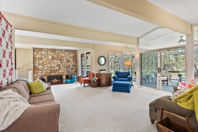 1206 Pinecrest Ln, New Richmond, WI 54017 - carpeted living area with ceiling fan and a stone fireplace