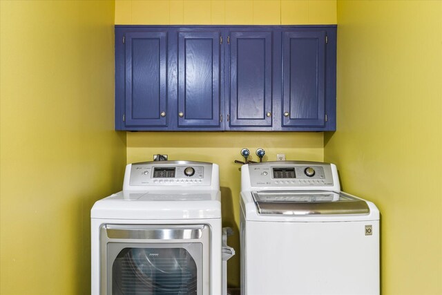 1206 Pinecrest Ln, New Richmond, WI 54017 - laundry room with cabinet space and washer and dryer