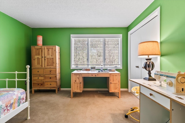 1206 Pinecrest Ln, New Richmond, WI 54017 - bedroom with an office area, light carpet, a textured ceiling, and baseboards