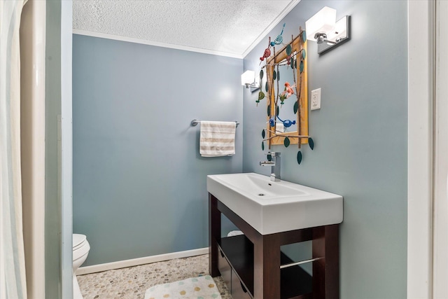 1206 Pinecrest Ln, New Richmond, WI 54017 - bathroom with toilet, a textured ceiling, baseboards, crown molding, and vanity