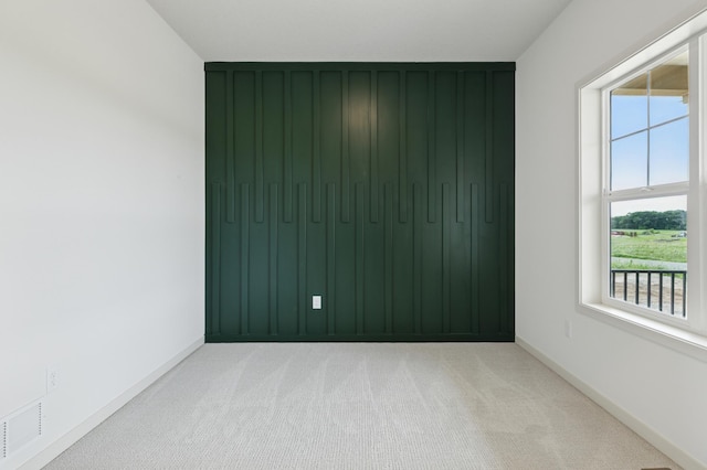 21959 Edison Ct NW, East Bethel, MN 55011 - carpeted spare room with baseboards