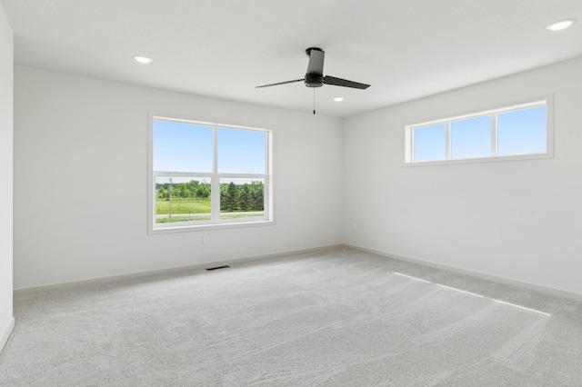 21959 Edison Ct NW, East Bethel, MN 55011 - spare room with ceiling fan, recessed lighting, and carpet floors