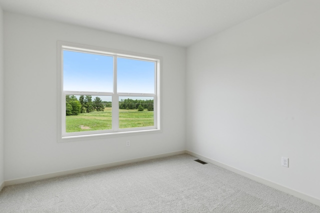 21959 Edison Ct NW, East Bethel, MN 55011 - carpeted empty room featuring baseboards