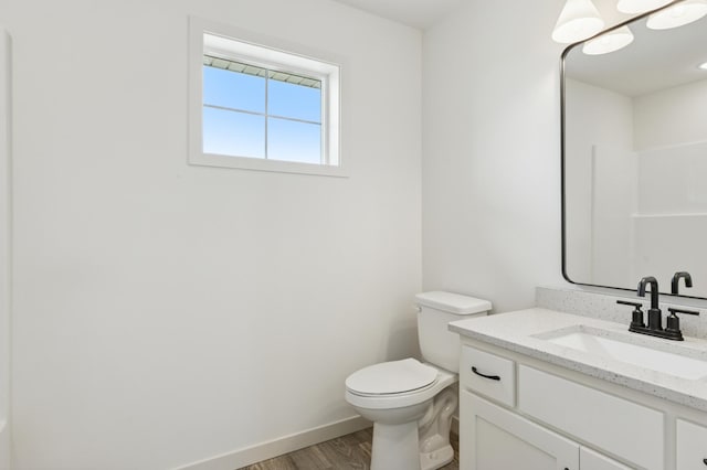 21959 Edison Ct NW, East Bethel, MN 55011 - bathroom featuring wood finished floors and vanity