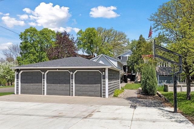 176 Peninsula Rd, Medicine Lake, MN 55441 - garage featuring concrete driveway