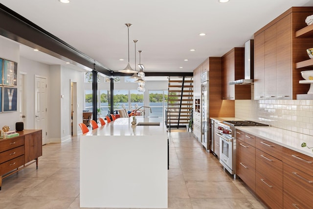 176 Peninsula Rd, Medicine Lake, MN 55441 - kitchen with high end appliances, wall chimney range hood, open shelves, modern cabinets, and recessed lighting