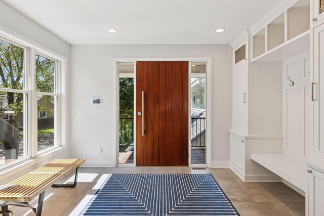 176 Peninsula Rd, Medicine Lake, MN 55441 - mudroom with healthy amount of natural light, baseboards, recessed lighting, and light tile patterned floors