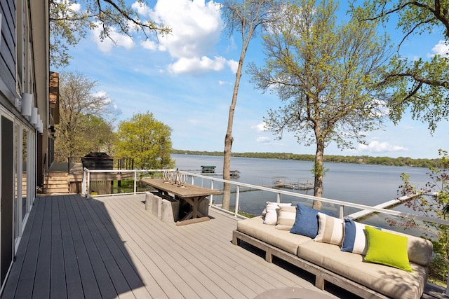 176 Peninsula Rd, Medicine Lake, MN 55441 - deck with outdoor lounge area and a water view