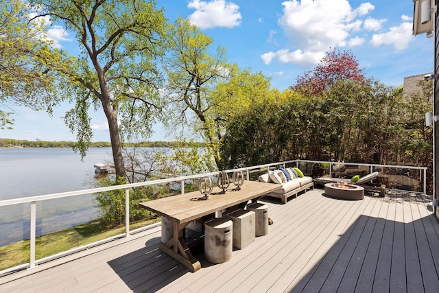 176 Peninsula Rd, Medicine Lake, MN 55441 - wooden terrace featuring a water view and an outdoor living space with a fire pit