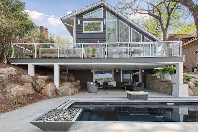 176 Peninsula Rd, Medicine Lake, MN 55441 - back of house with an outdoor hangout area, a deck, and a patio area