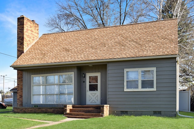 view of front of house featuring a chimney, a shingled roof, crawl space, and entry steps