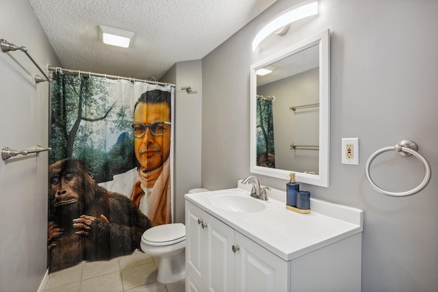 1112 Gabbert Cir, Eagan, MN 55123 - bathroom with a textured ceiling, vanity, toilet, tile patterned floors, and a shower with shower curtain