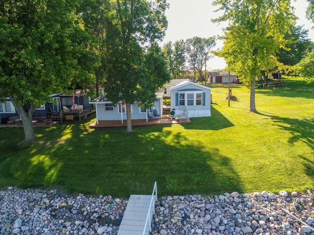 view of yard featuring a wooden deck