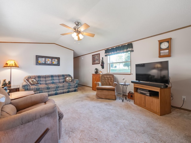 living room with vaulted ceiling, ceiling fan, and light carpet