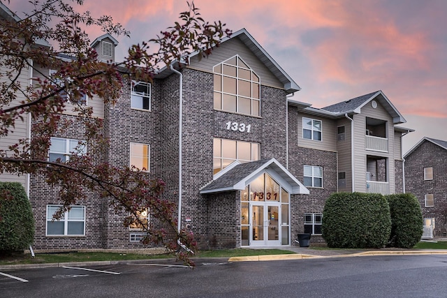 view of property at dusk