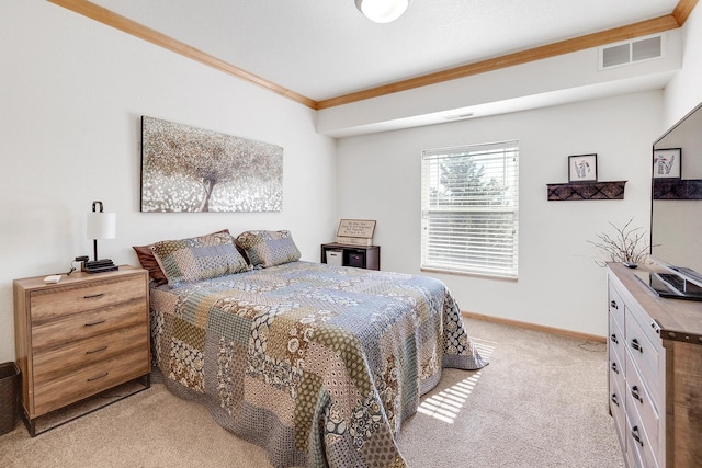 bedroom featuring light colored carpet, ornamental molding, and baseboards