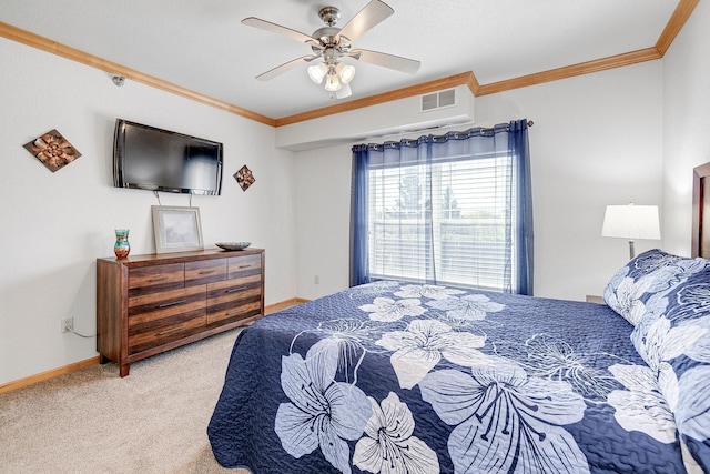 carpeted bedroom with crown molding, ceiling fan, and baseboards