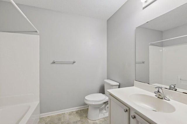 full bathroom with toilet, baseboards, vanity, shower / bathtub combination, and a textured ceiling