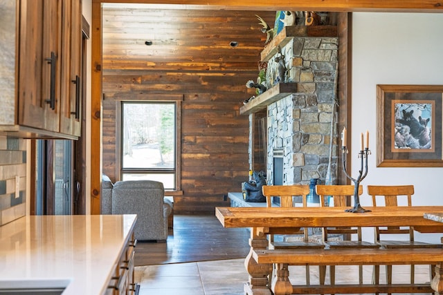 dining room featuring wooden walls
