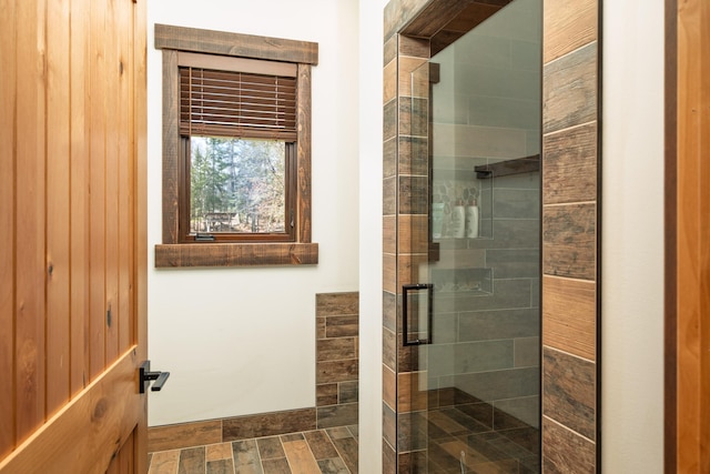 full bathroom featuring a shower stall