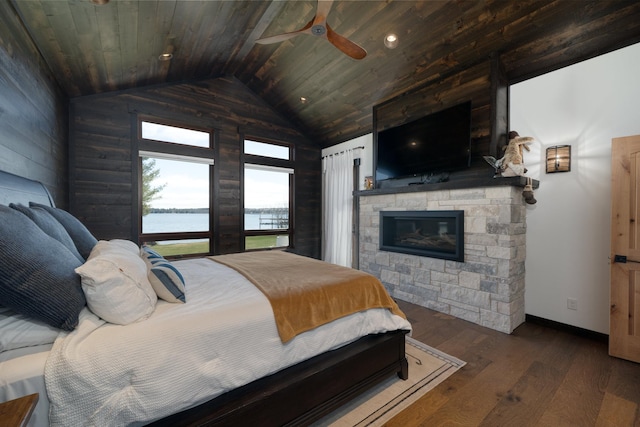 bedroom with lofted ceiling, wood ceiling, baseboards, and wood-type flooring