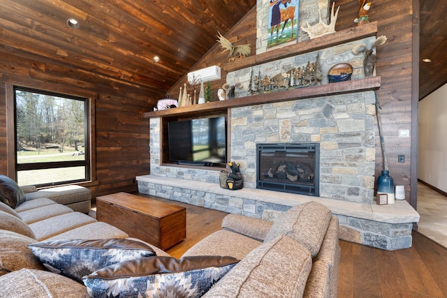living area featuring lofted ceiling, recessed lighting, wood ceiling, wood finished floors, and a fireplace