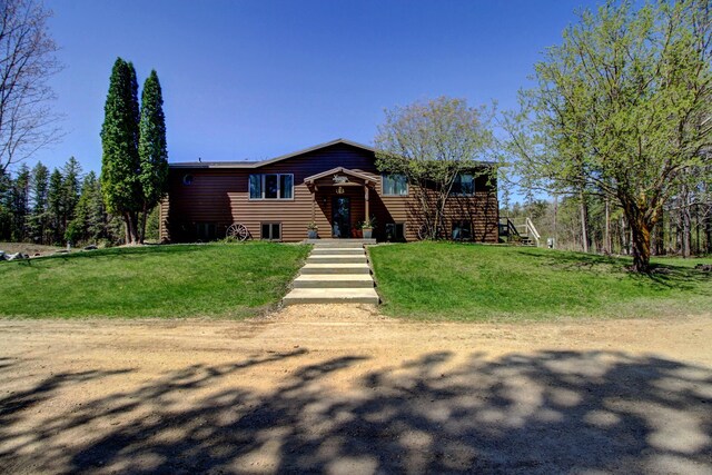 32290 US-71, Menahga, MN 56464 - view of front of home with a front lawn and log veneer siding