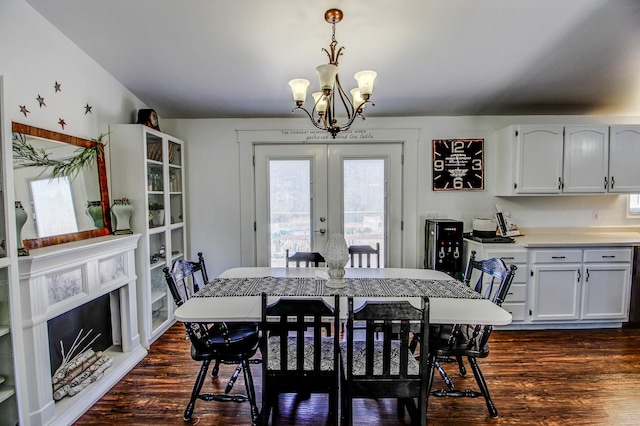 32290 US-71, Menahga, MN 56464 - dining space featuring french doors, a chandelier, and dark wood-style floors
