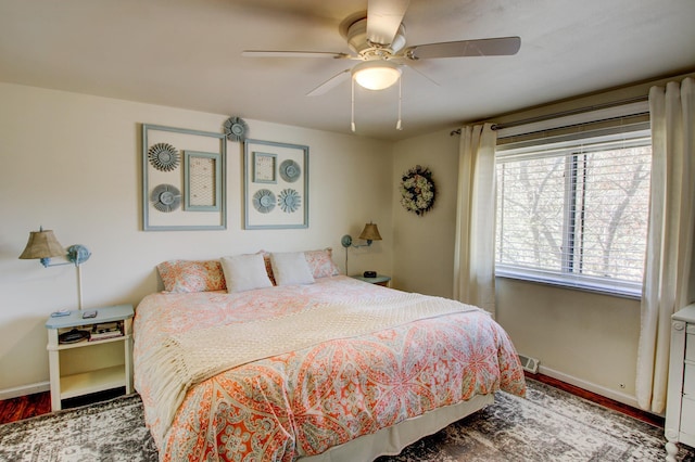 32290 US-71, Menahga, MN 56464 - bedroom with baseboards, wood finished floors, and a ceiling fan