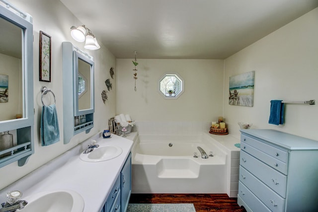 32290 US-71, Menahga, MN 56464 - full bathroom featuring a bath, wood finished floors, and double vanity